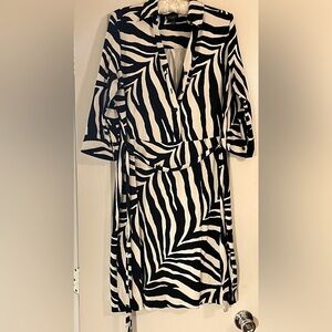 Talbots black and white animal print dress beautiful on! P to p is 20”. Size XP.